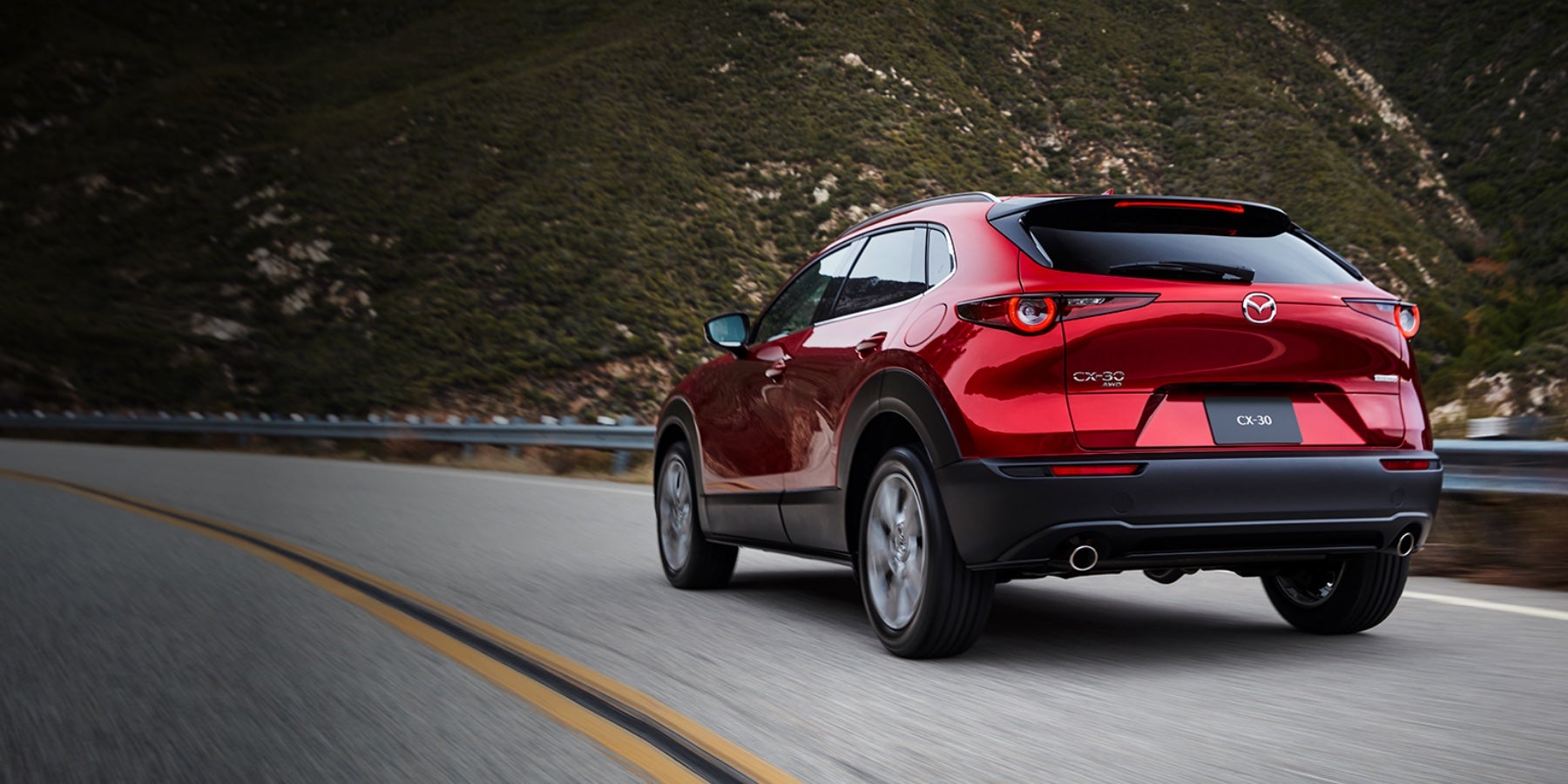 Red 2020 Mazda CX-30 Driving on the road | Koons Mazda Silver Spring in Silver Spring, MD